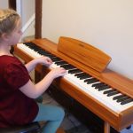 playing a donner piano