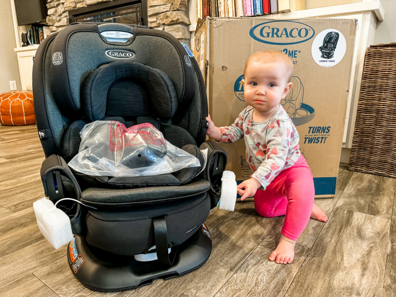 https://www.emilyreviews.com/wp-content/uploads/2022/12/Graco-Turn2Me-3-in-1-Rotating-Car-Seat-Review.jpg